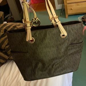 micheal Korda signature purse